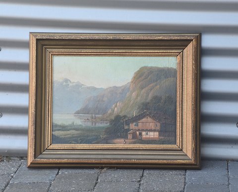 Maleri Hus ved sø bagved Bjerge