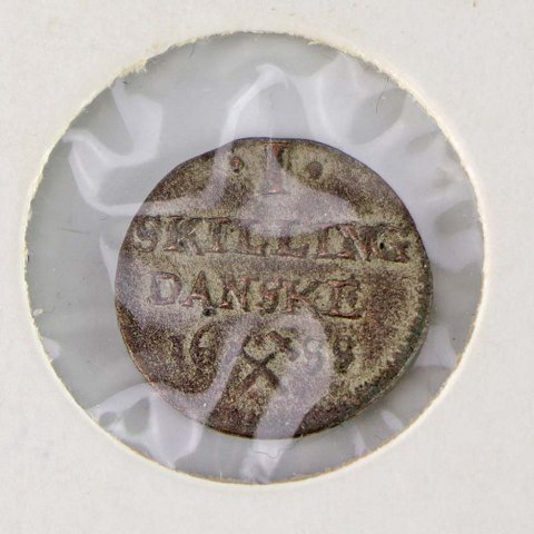 Antik mønt
Norsk 1 skilling
år 1688
1,5 cm