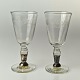 2 antikke glas på fod
sølv om stilk